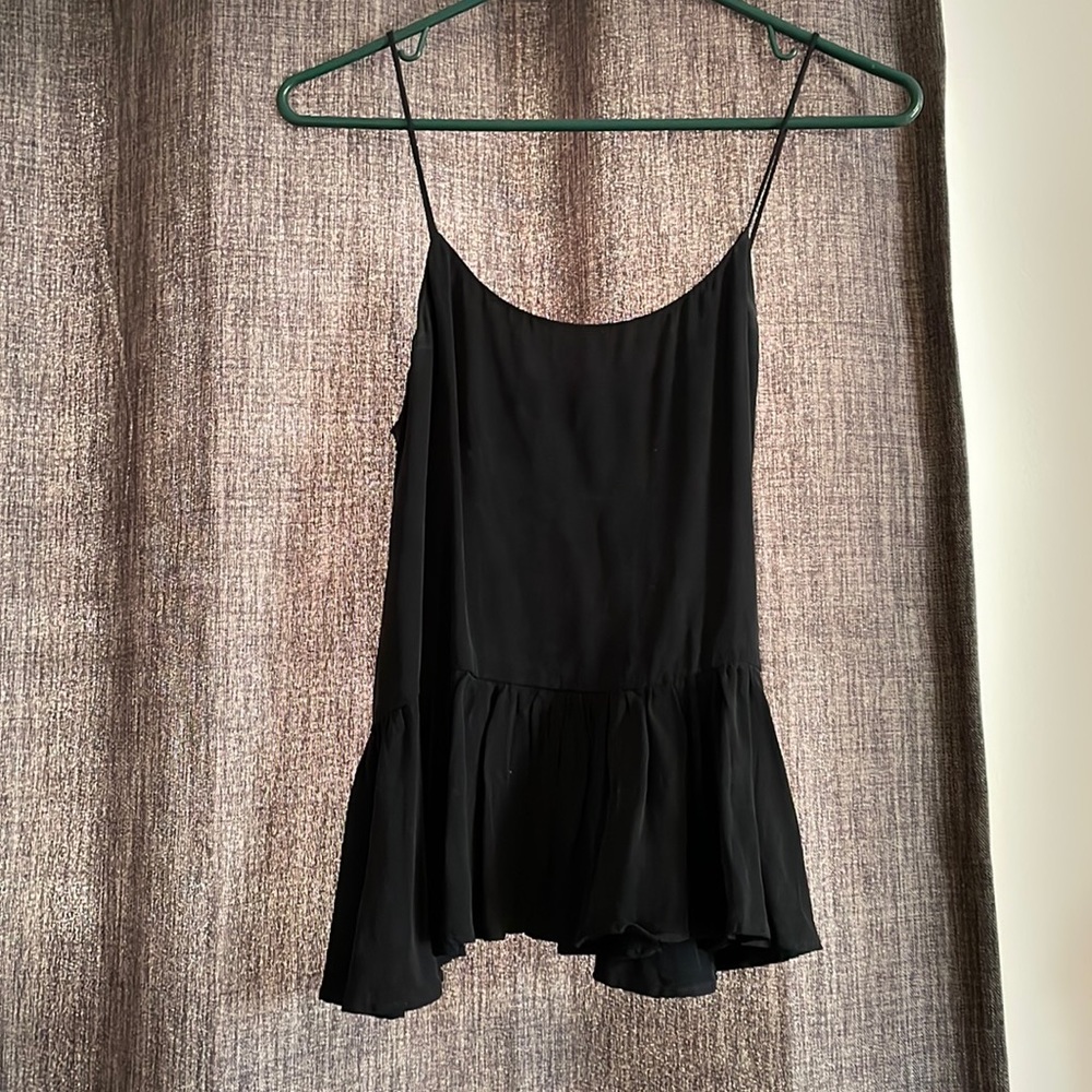 Lightweight tank top for summer or dinner out! Form fitting bust/flowy bottom
